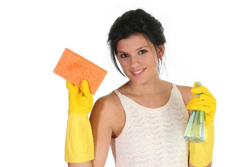 Local cleaning team maintaining a Sutton apartment building entrance